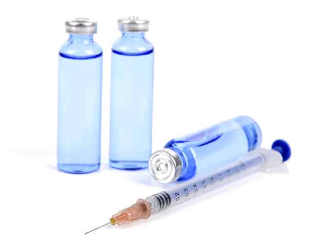 raffles medical - vials and syringe of vaccine