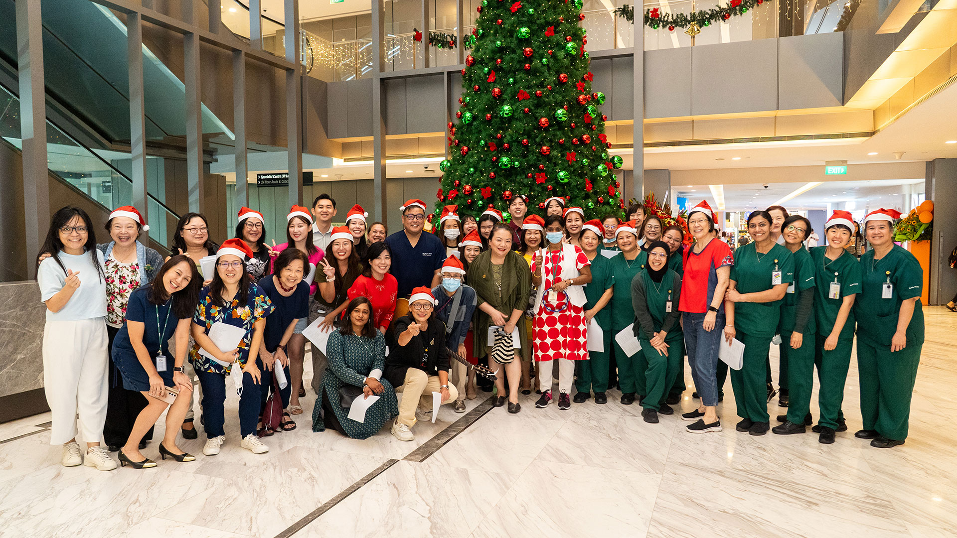 volunteers christmas carole raffles hospita 2025