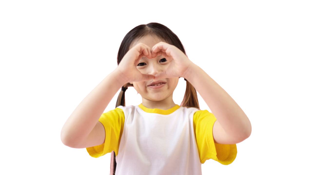 Illustration of a child making binoculars with their hands, accompanying a contact section inviting parents to make an enquiry or book a paediatric eye appointment.