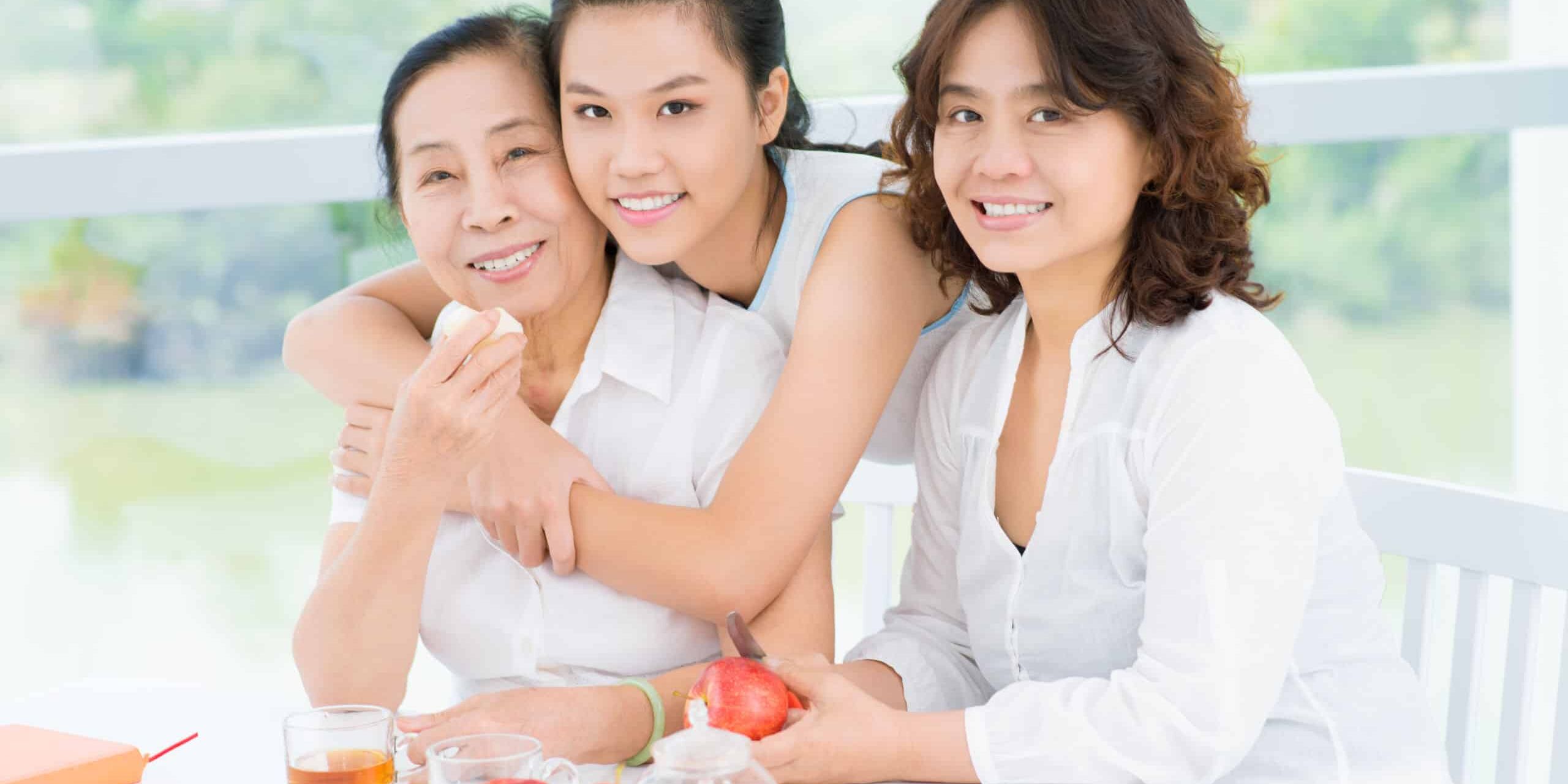 Women across different generation having tea together